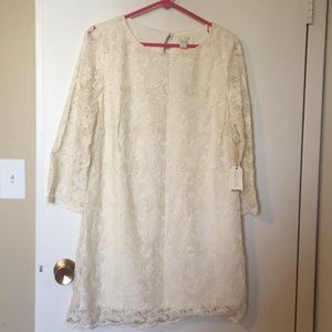 Cream colored a scallop hem dress